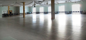 The Ballroom with chairs lining the perimeter