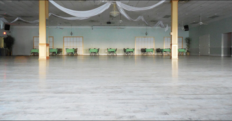The Ballroom with tables lining the perimiter